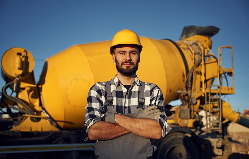 Homeowner in New Jersey reviewing quotes and avoiding red flags when hiring a concrete contractor from Pete’s Concrete & Masonry