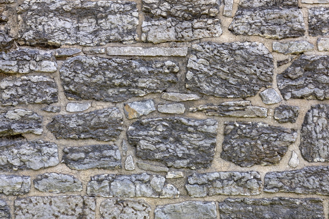 Real Cost Breakdown: Brickwork, Blockwork, and Stonework in NJ (2026 Guide) 2 Natural stone masonry installation in New Jersey showcasing stonework used for exterior walls and landscaping