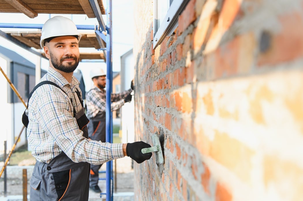 Pete's Concrete & Masonry completing brick masonry repair on a New Jersey residential property
